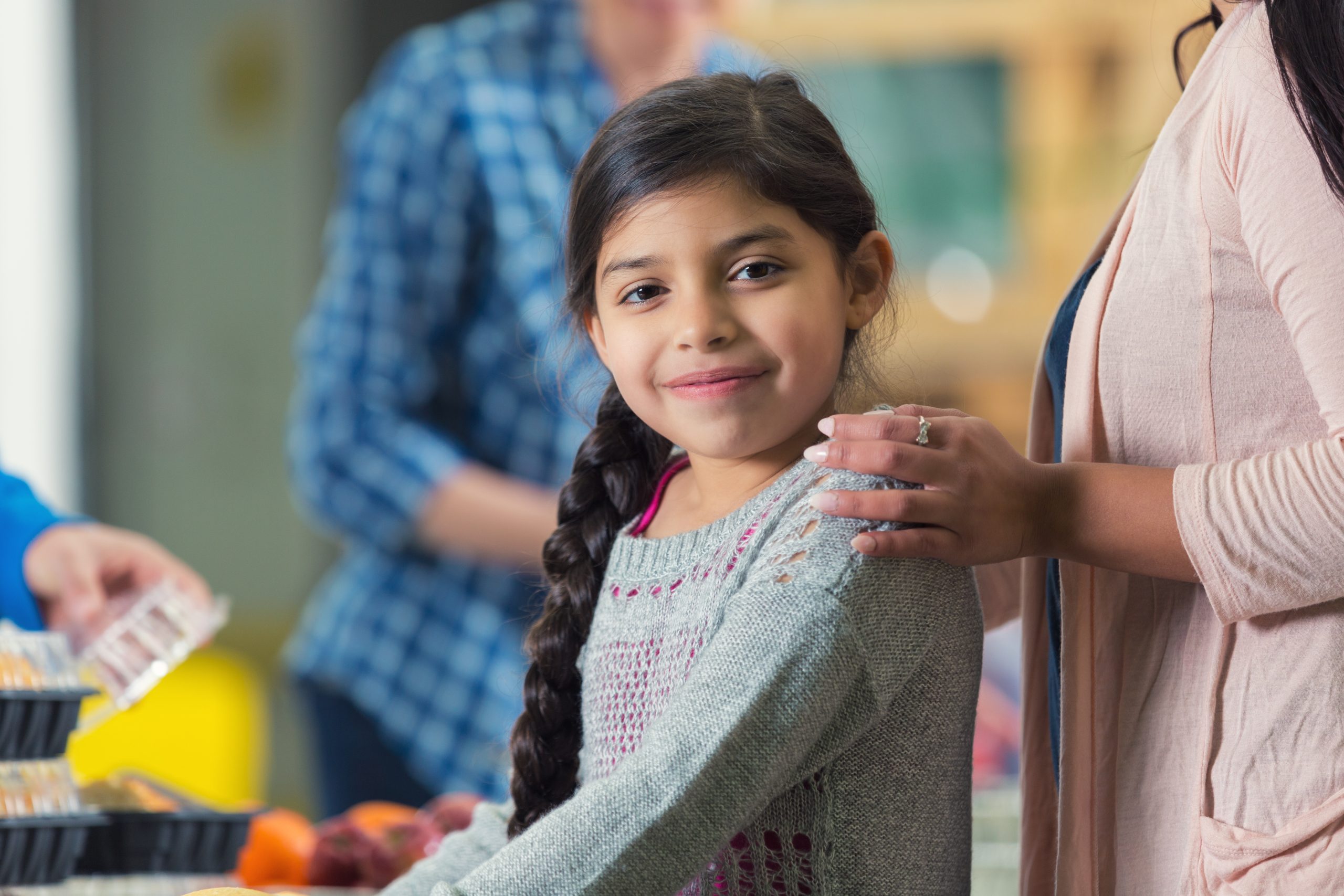 Photo of a girl being supported at school.